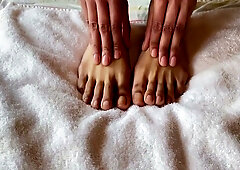 Viva Athena, tattooed brunette, teases her feet with clear nails in solo fetish play