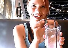 Flirty chick gladly flashes her nipples at a restaurant