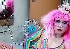Transgender Le wears sexy clothes and plays cups of sex. Artificial cans